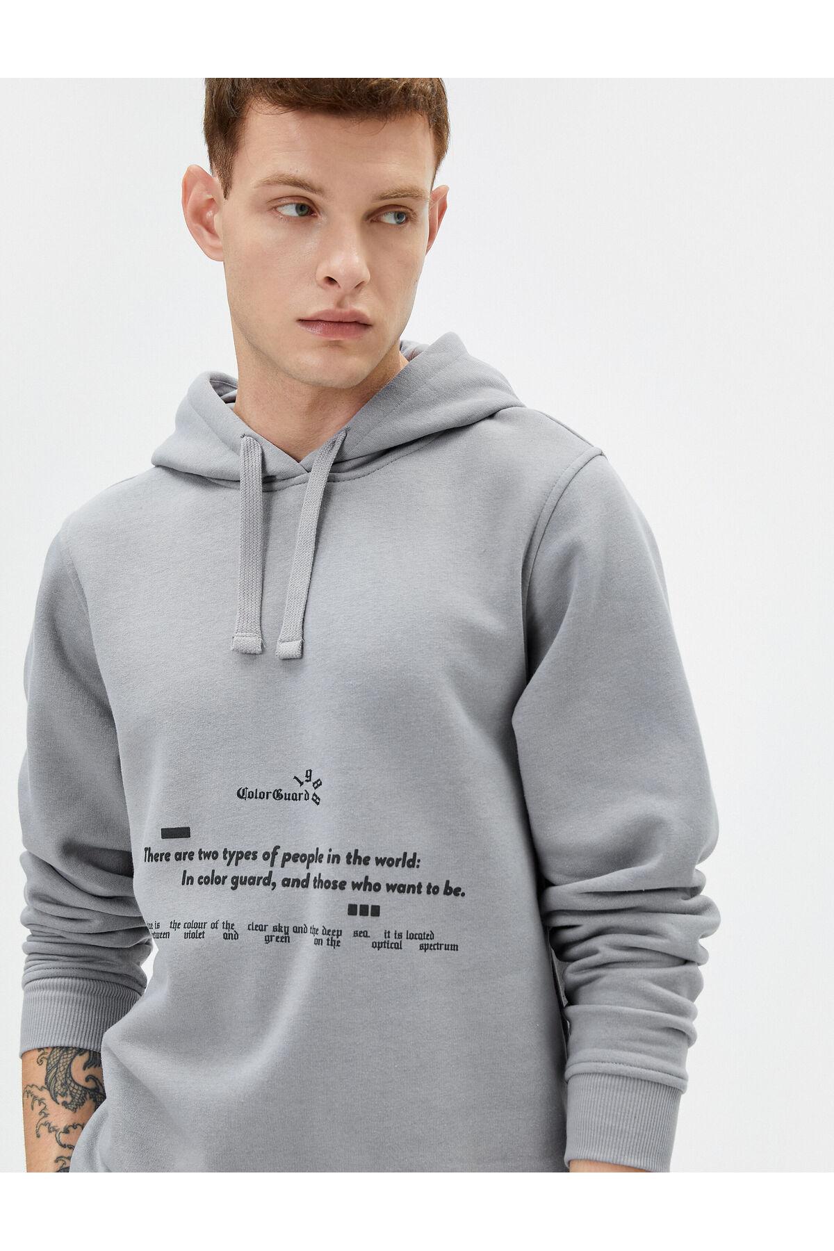 بلوز آستین بلند کلاه دار با چاپ پشت